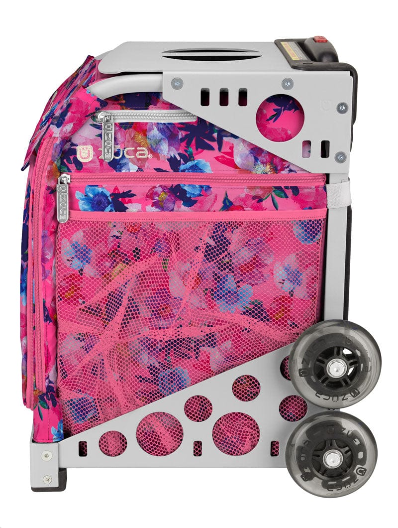 Profile view of floral pink insert paired with a white Zuca rolling skating bag frame. Frame Sold Separately. Canada -