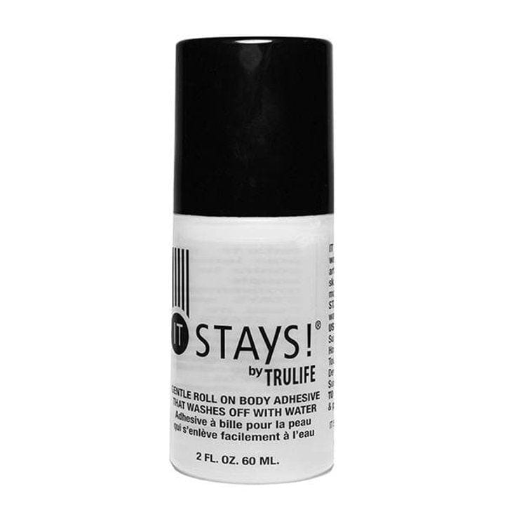 Roll-on clear plastic bottle with black twist top. Black writing says It Stays! by Trulife. Gentle roll on body adhesive that washes off with water. Adhesive à bille pour la peau qui s'enleve facilement à l'eau. 2 FL. Oz. 60 ML.