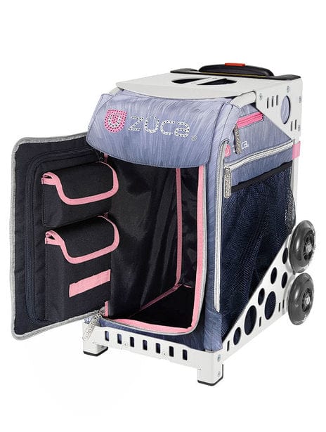 The word ZUCA is outlined in clear rhinestones on this inset. The front zippered door is open and reveals a black interior with a pastel pink trim on two doors. This insert is paired with white frame, which is sold separately.