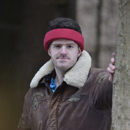 High density ice halo worn by man in the woods.